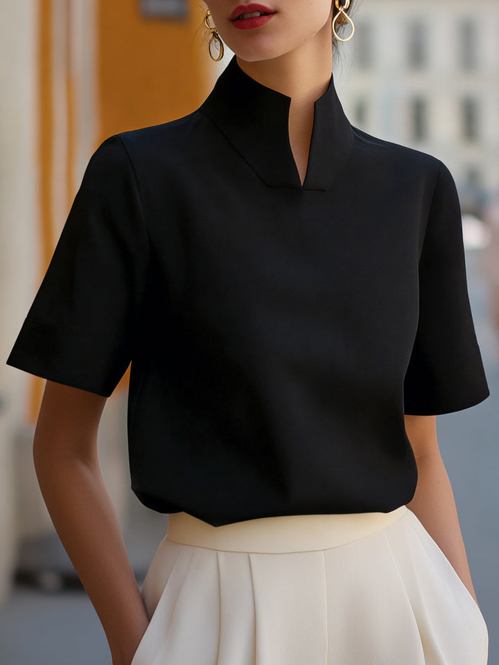 Minimalistische strukturierte Bluse mit Stehkragen