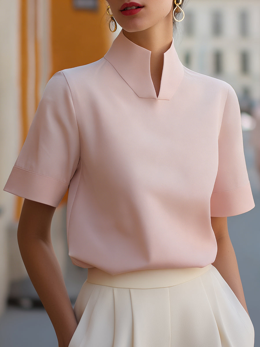Minimalistische strukturierte Bluse mit Stehkragen