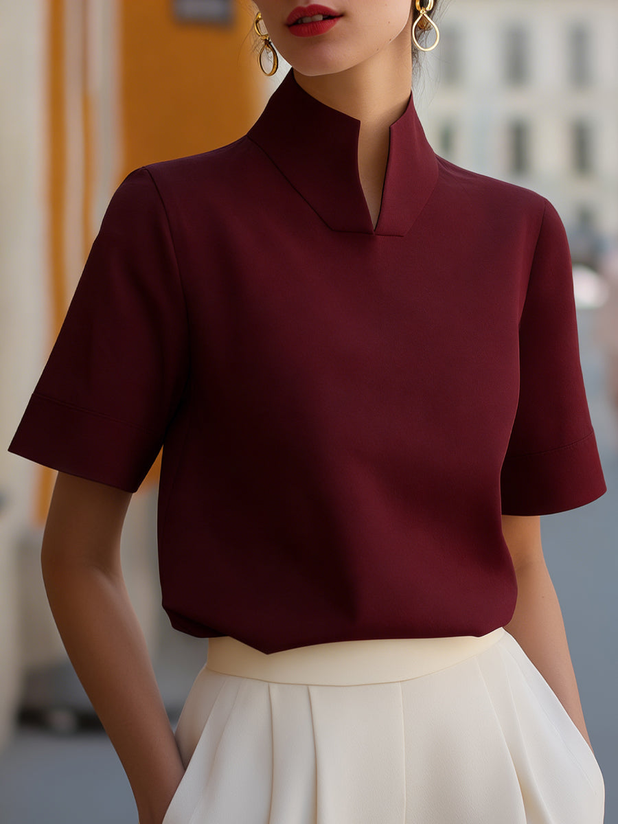 Minimalistische strukturierte Bluse mit Stehkragen