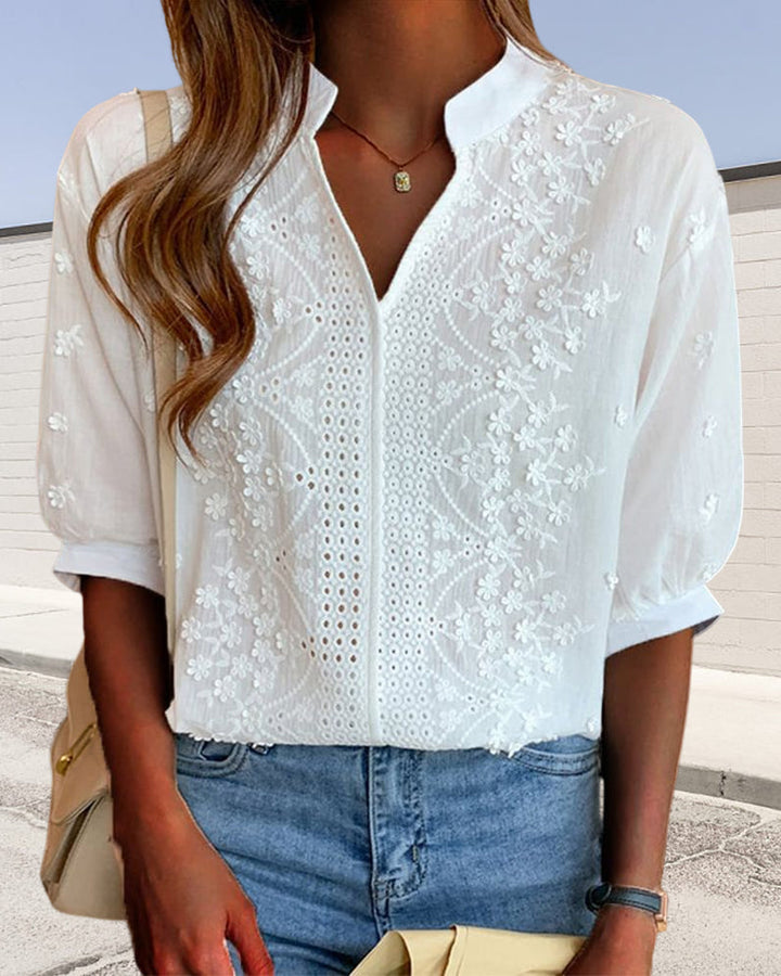 Bluse mit V-Ausschnitt und Puffärmeln