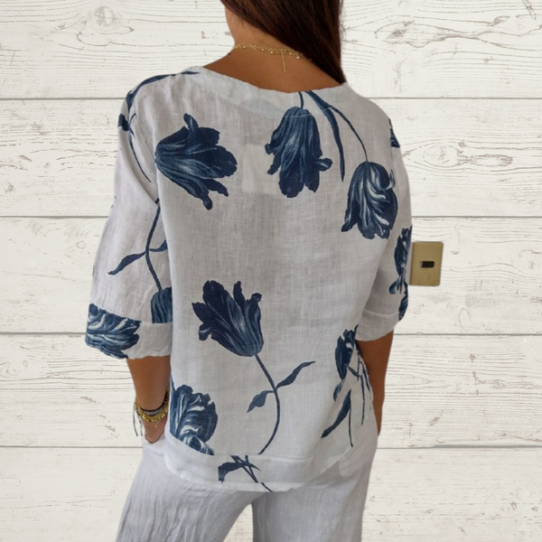 Despoina - Elegantes Blumentop mit Knöpfen