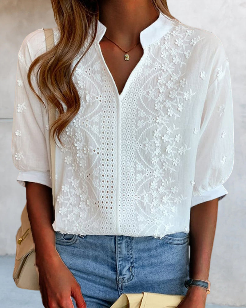 Bluse mit V-Ausschnitt und Puffärmeln