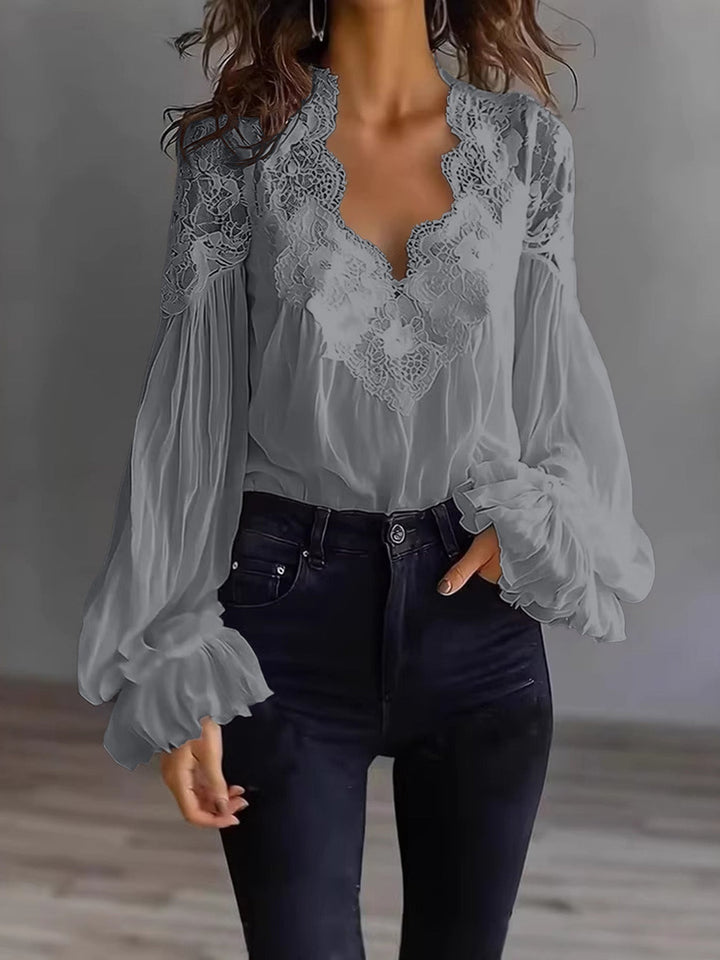 Joelle - Elegante Spitzenbluse mit Puffärmeln