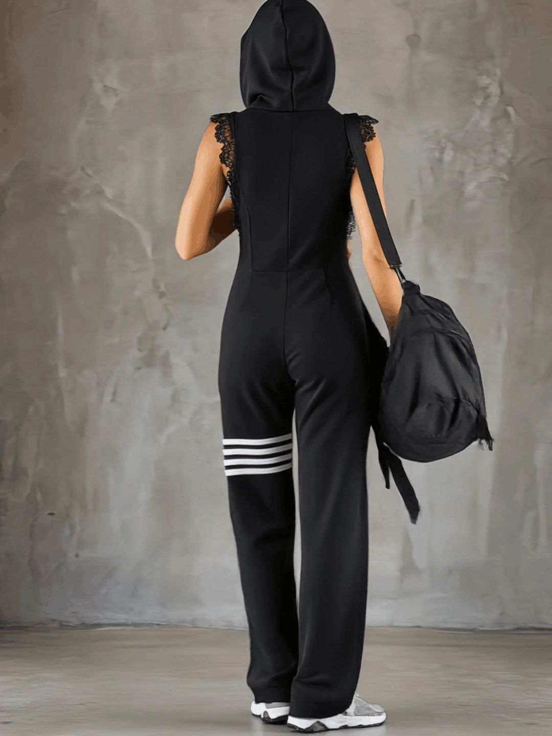 Daniela - Sportlicher Retro-Overall mit Kapuze und Streifen