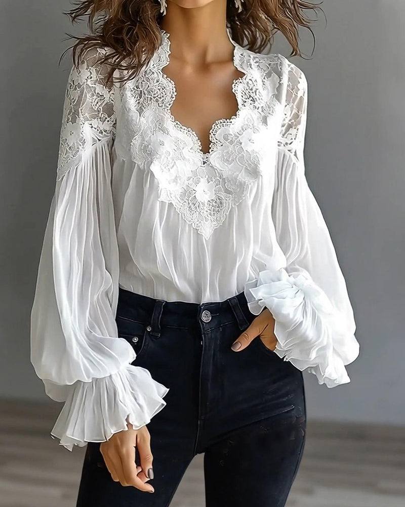 Joelle - Elegante Spitzenbluse mit Puffärmeln
